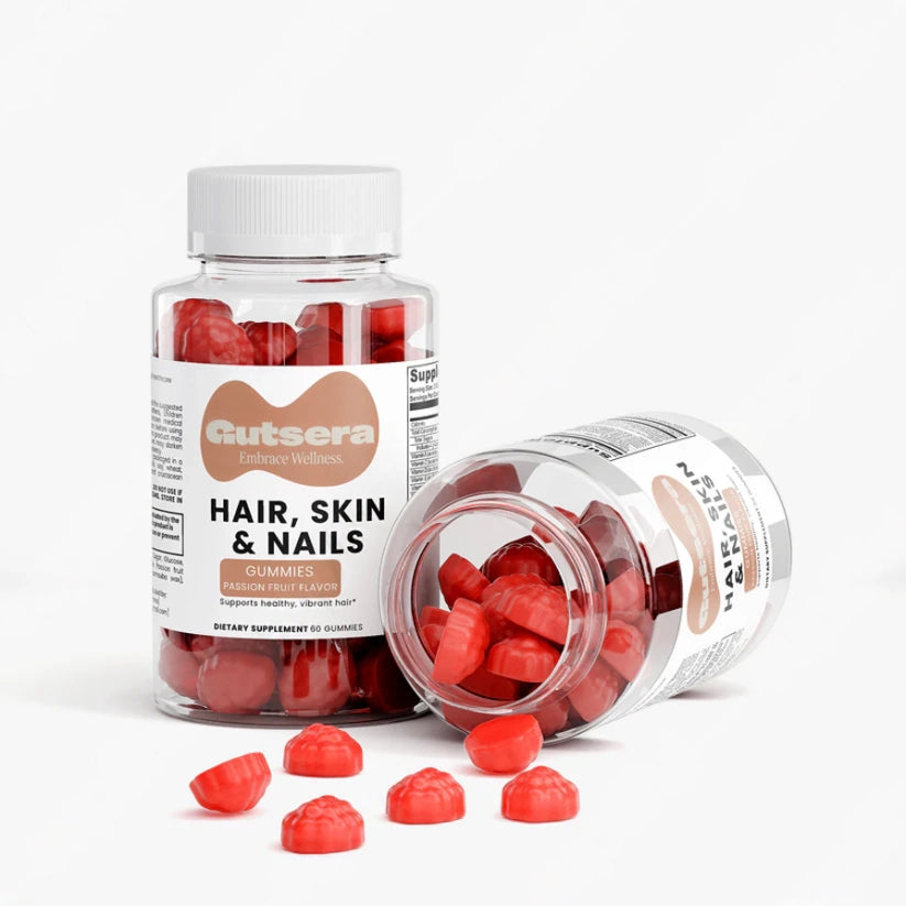 Hair, Skin & Nails gummy supplement bottles with red gummies on a white background